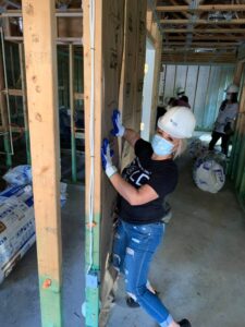 Volunteers building homes during Be the Sunshine Week in August 2021