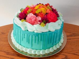 Beautiful floral cake baked by Sunshine State Sweets