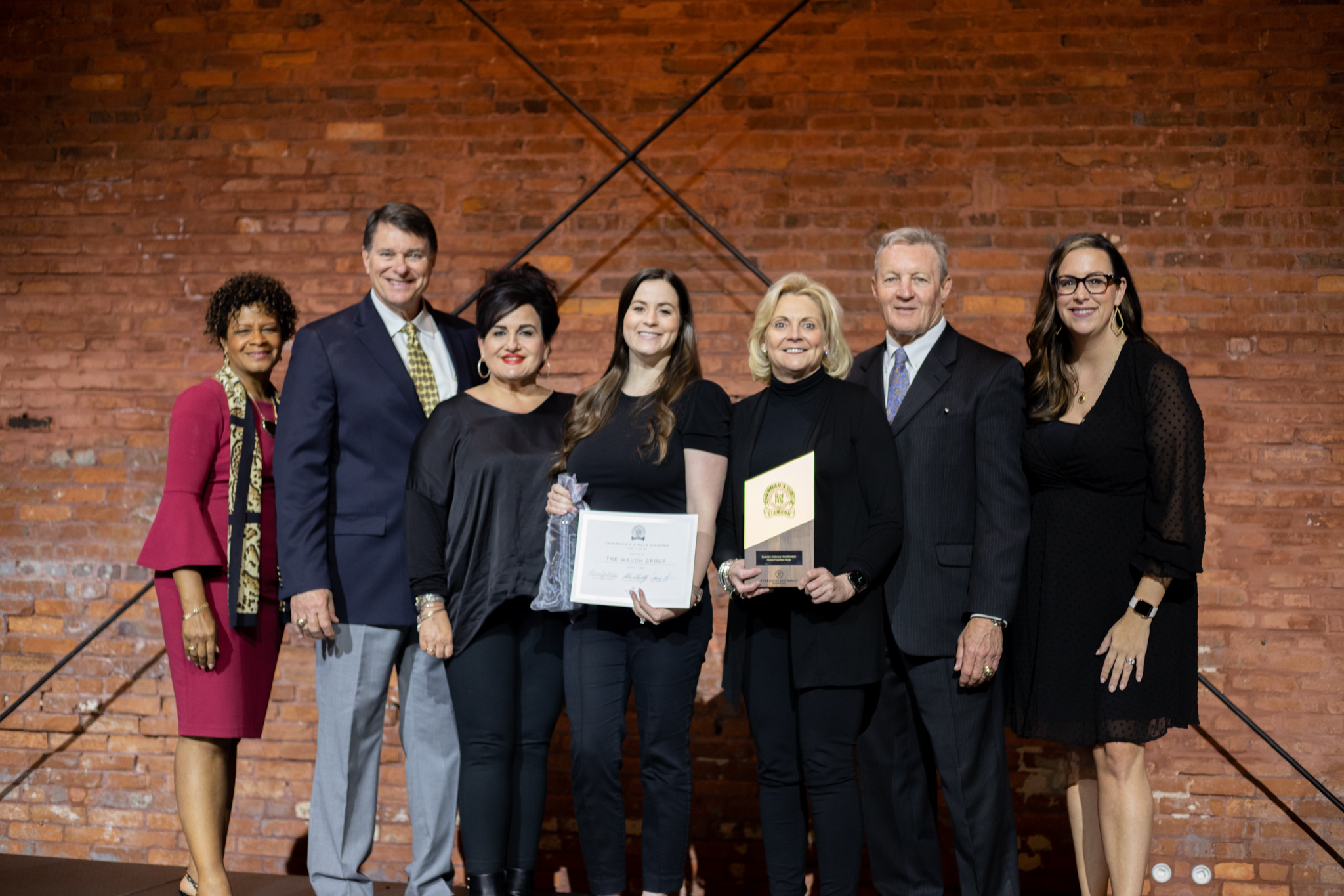 Real Estate Agent Tammy Waugh and her team at the 2022 Berkshire Hathaway HomeServices Florida Properties Group Awards Ceremony