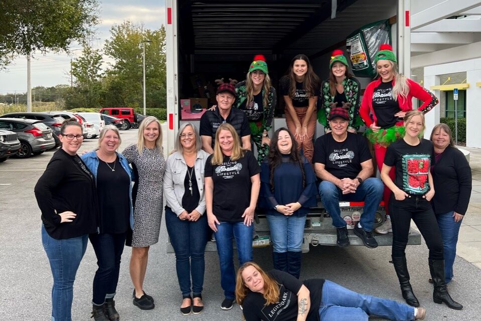 employees at cabernet sleigh collection point with uhaul