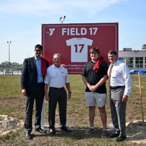 Allen Crumbley recognized with the dedication of Field 17 by local YMCA.